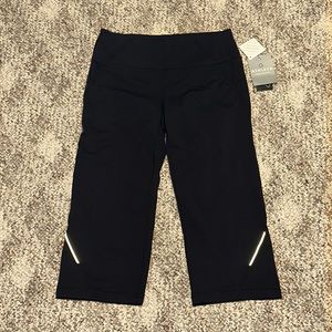 Athleta size small “Power Kick Capri”, black, new with tags!!